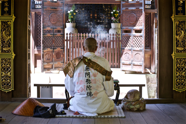 Buddhist monk playing the shakuhachi